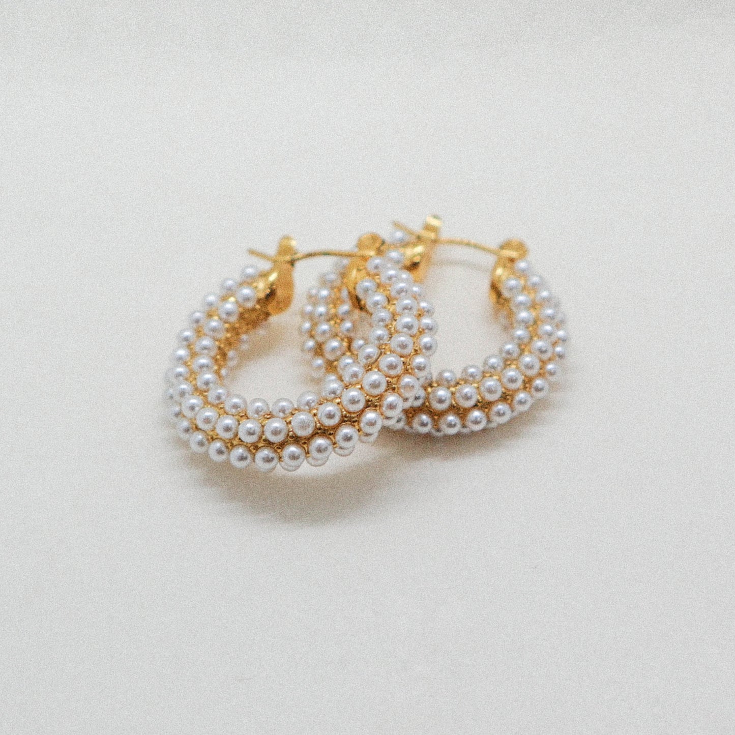 The pearl earrings